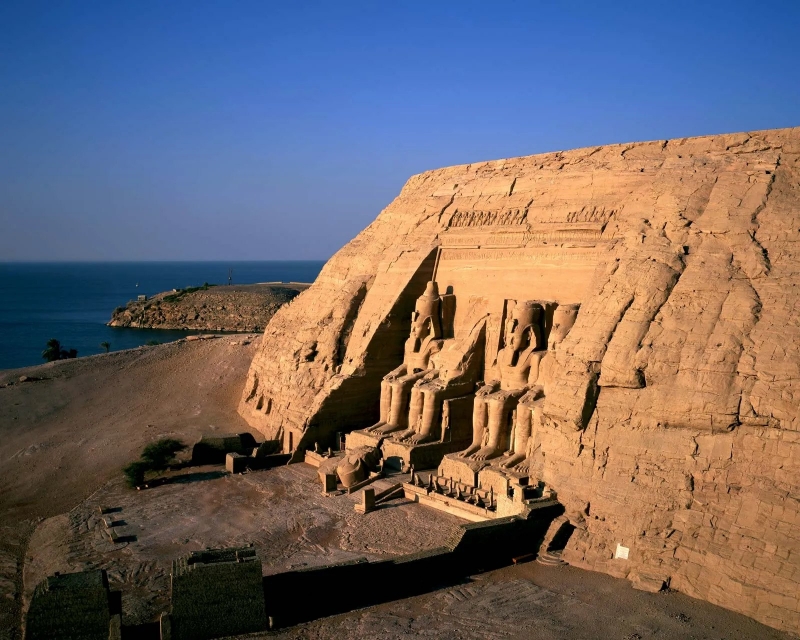 Abu Simbel Great Temple above the blue water of Lake Nasser